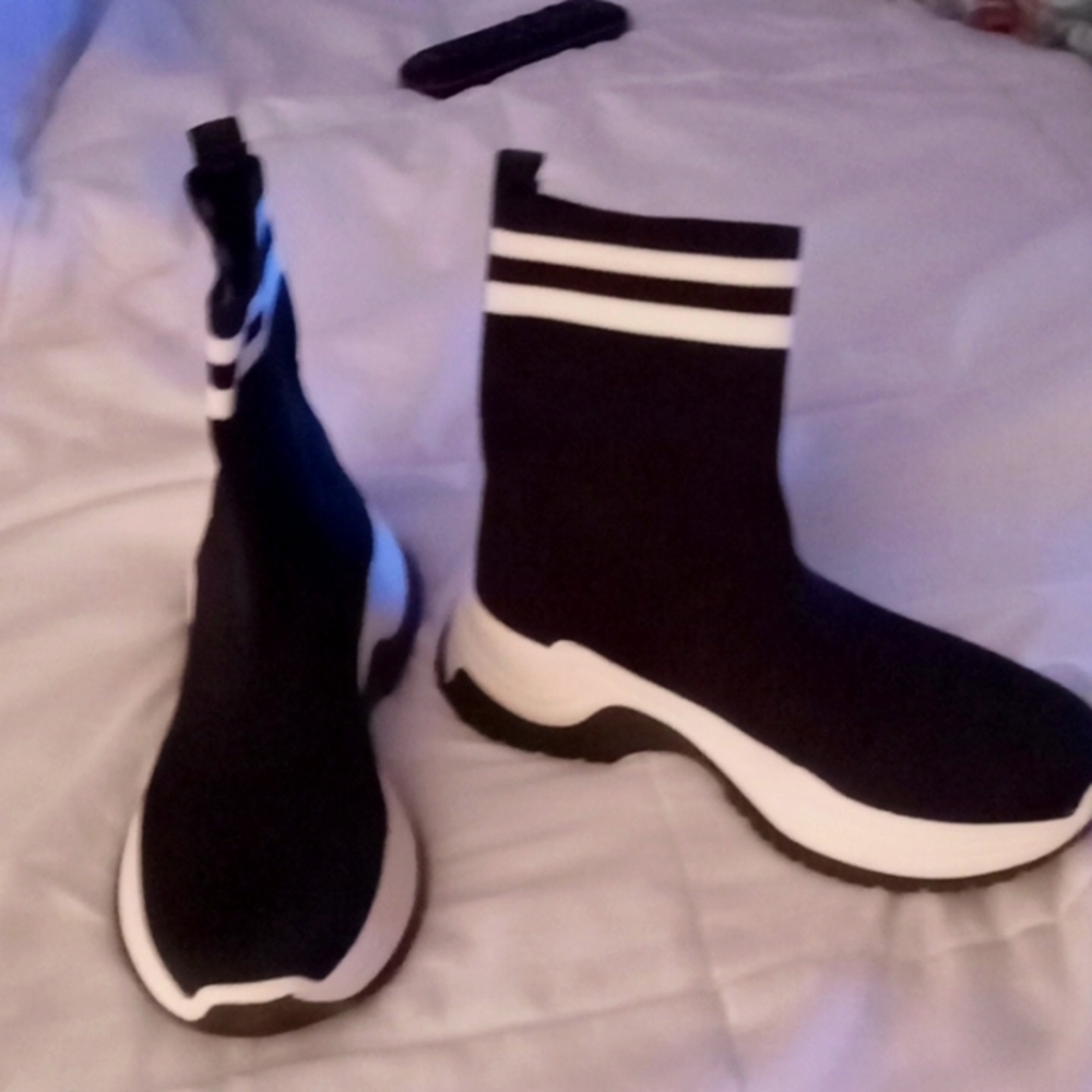 I'm selling some black and white high-top shoes